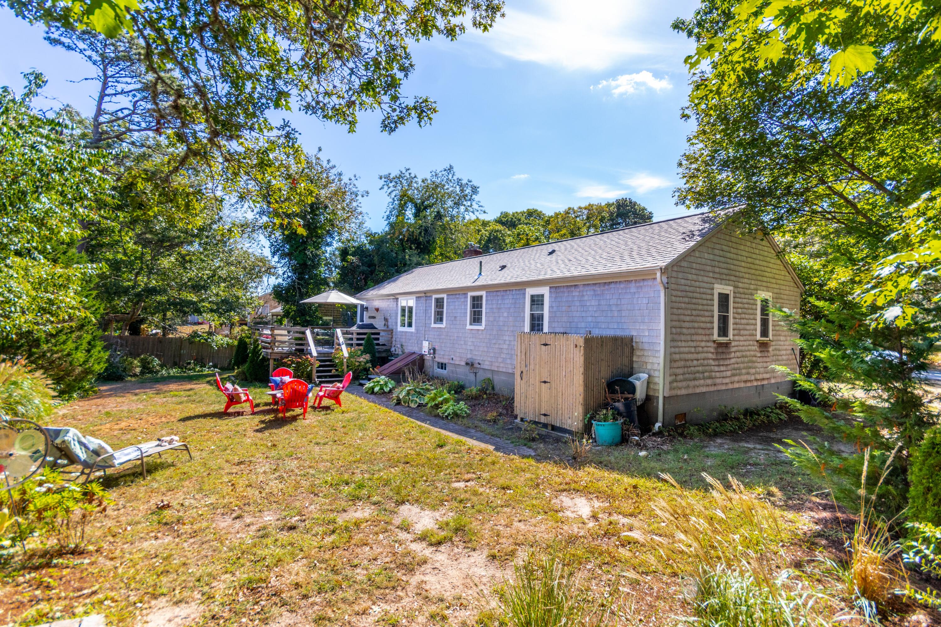 42 Agnes Road South Dennis, MA 02660 - Photo 3 of 36 a view of a house with a yard and tree