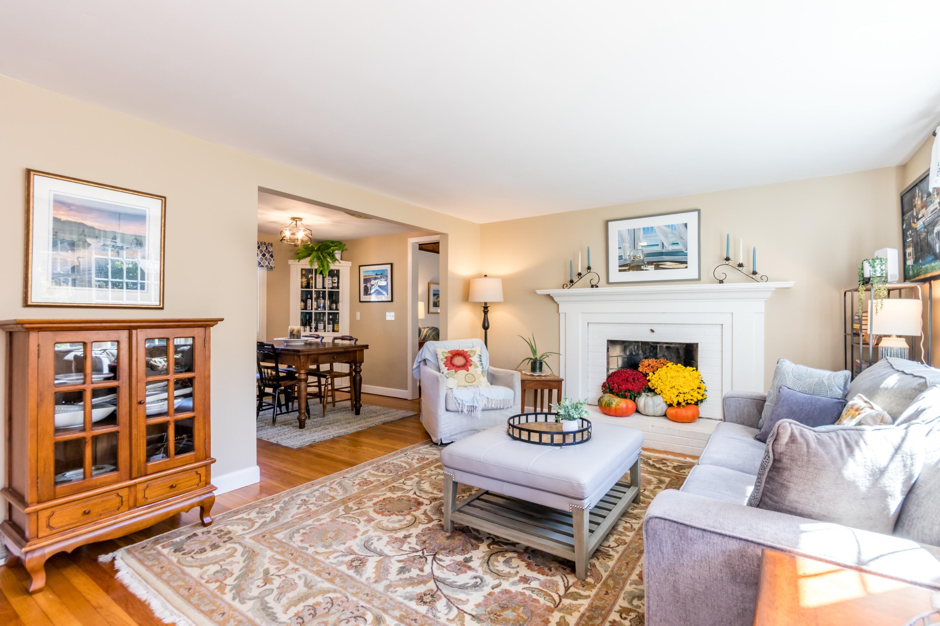 42 Agnes Road South Dennis, MA 02660 - Photo 4 of 36 a living room with furniture and a fireplace