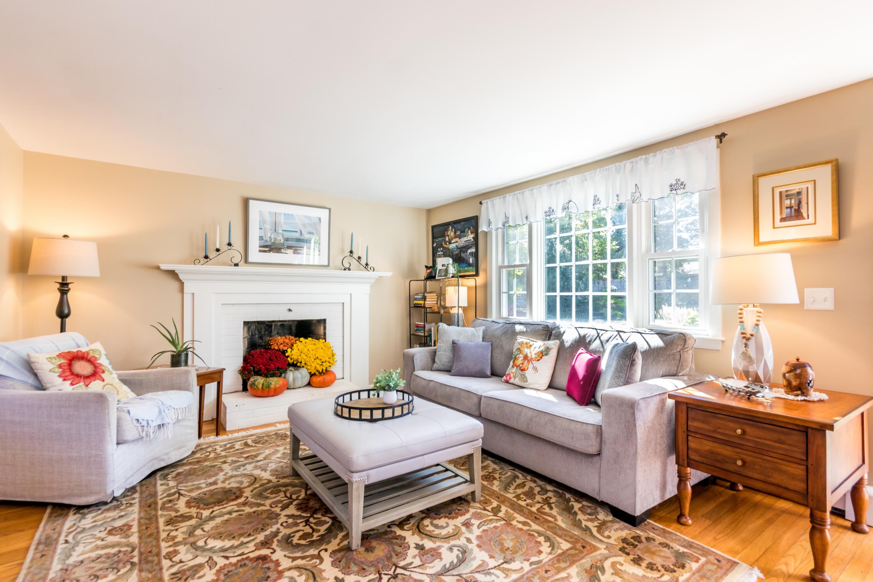 42 Agnes Road South Dennis, MA 02660 - Photo 5 of 36 a living room with furniture and a fireplace