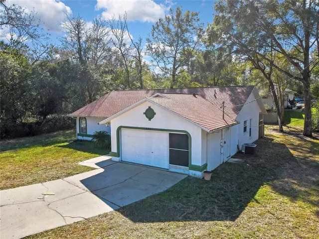 a house view with a garden space