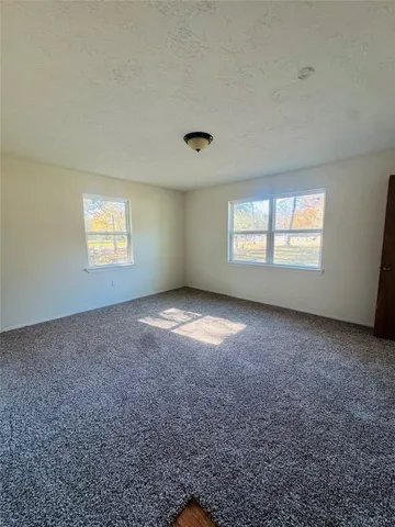 a view of a livingroom with a window