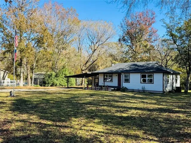a front view of house with yard