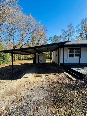 a kitchen with stainless steel appliances granite countertop a stove sink and cabinets