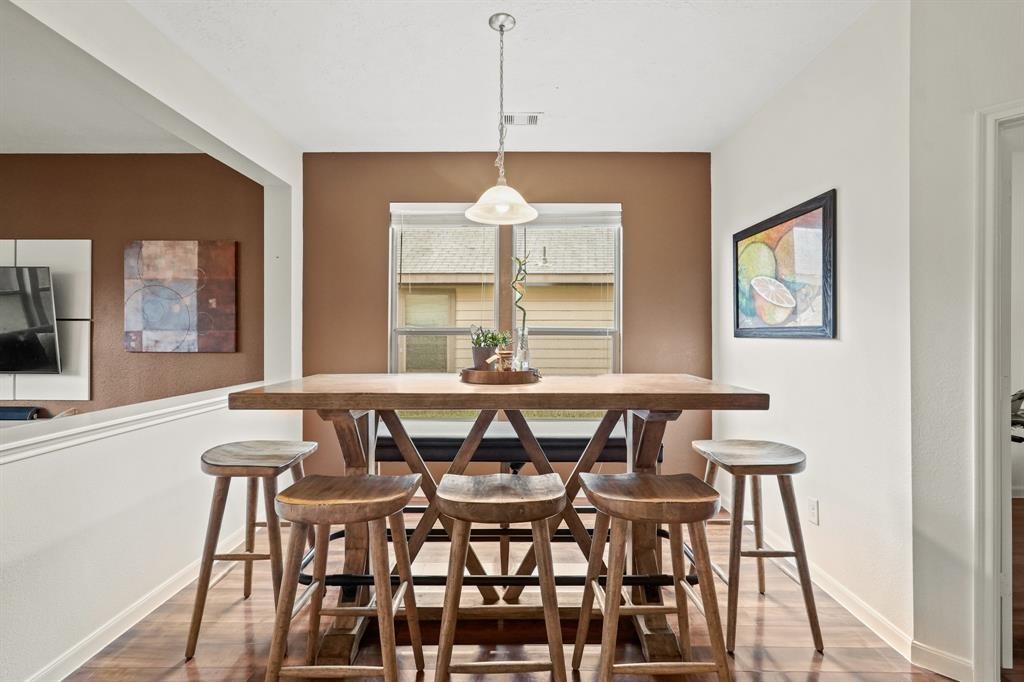 6719 Path Way Court Katy, TX 77449 - Photo 8 of 35 a view of a dining room with furniture and windows
