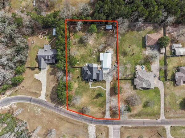 a living room with furniture fireplace and a flat screen tv