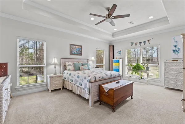 a spacious bathroom with a granite countertop sink a mirror and a