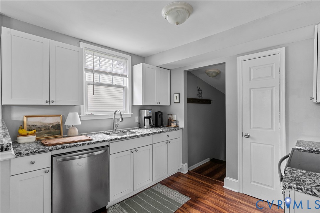 104 West Union Street Sandston, VA 23150 - Photo 13 of 33 a kitchen with a sink a window and cabinets