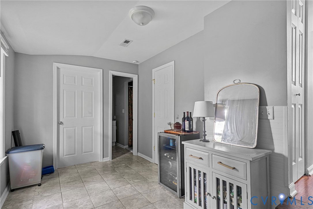 104 West Union Street Sandston, VA 23150 - Photo 17 of 33 a kitchen with cabinets and window