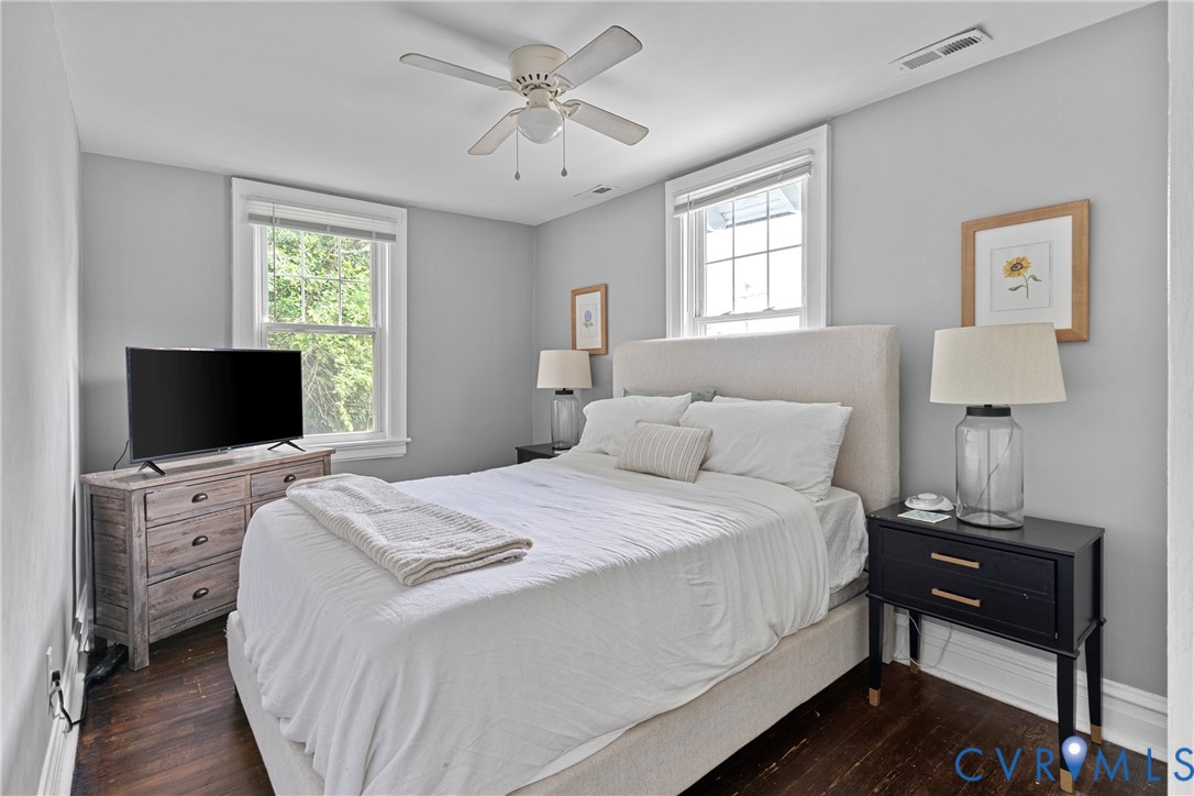 104 West Union Street Sandston, VA 23150 - Photo 20 of 33 a bedroom with a bed and a flat screen tv