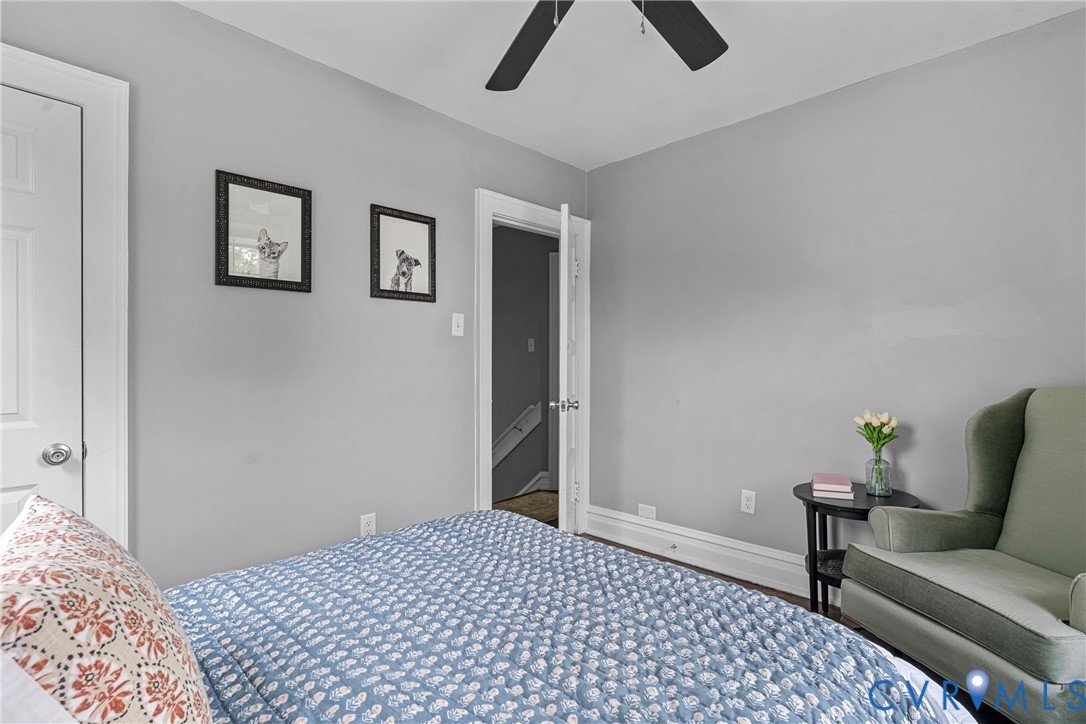 104 West Union Street Sandston, VA 23150 - Photo 25 of 33 a bedroom with a bed and a couch