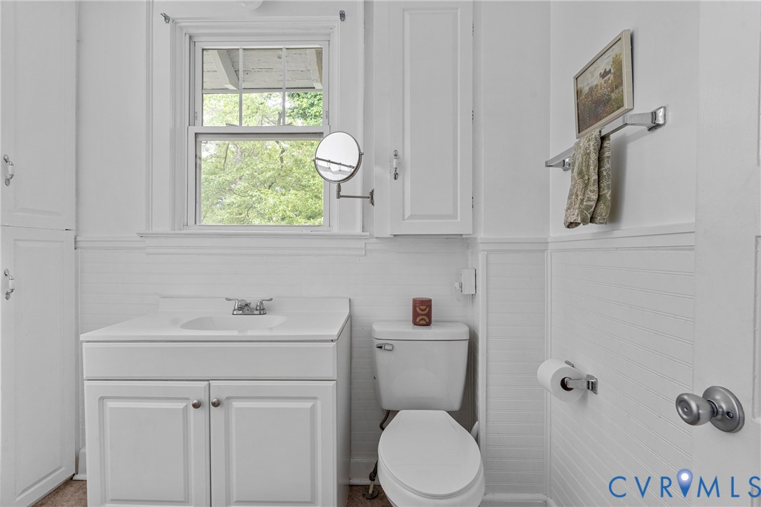 104 West Union Street Sandston, VA 23150 - Photo 27 of 33 a bathroom with a toilet sink and window