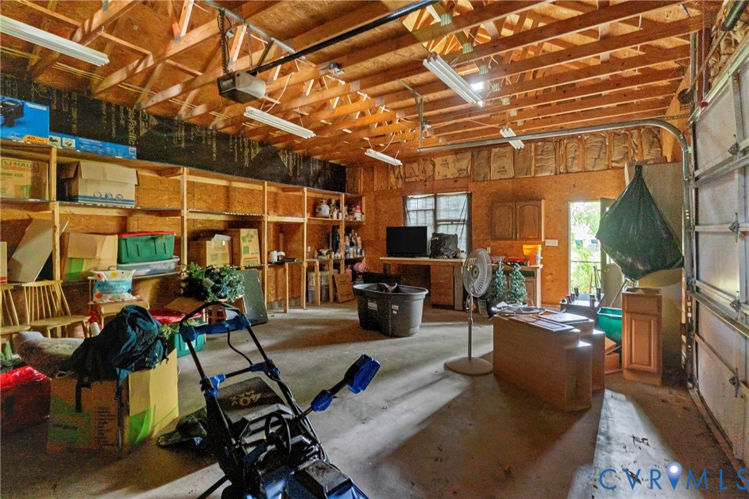 104 West Union Street Sandston, VA 23150 - Photo 30 of 33 a view of a patio with table and chairs potted plants