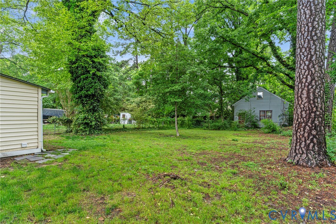 104 West Union Street Sandston, VA 23150 - Photo 32 of 33 a view of a backyard with large trees