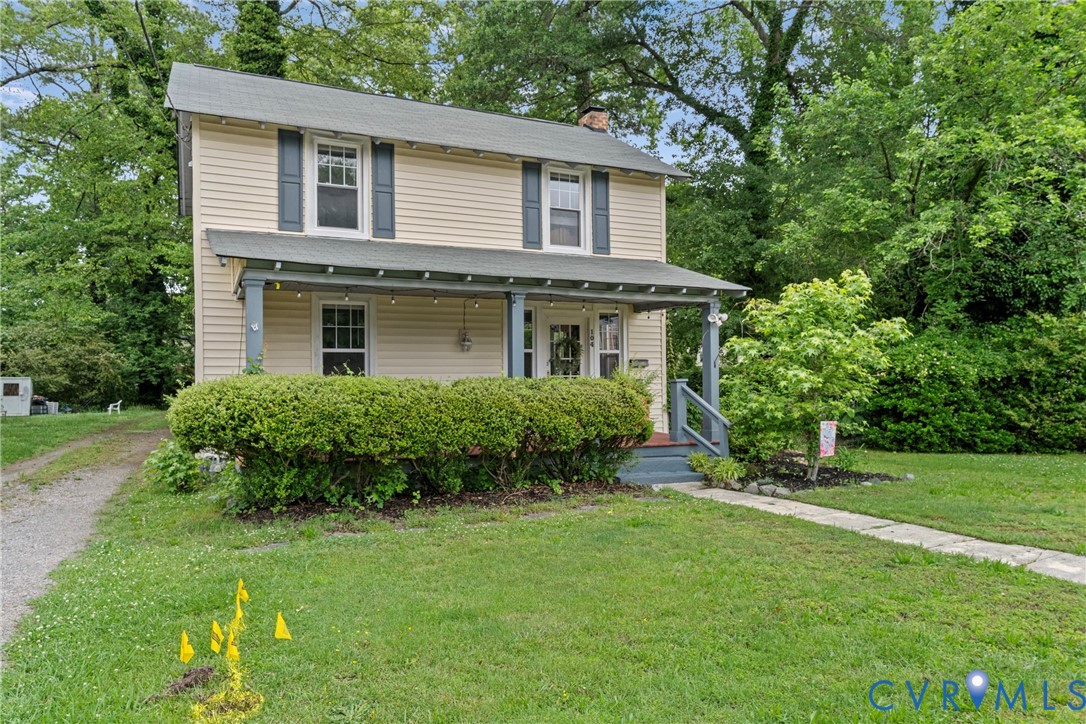 104 West Union Street Sandston, VA 23150 - Photo 4 of 33 a front view of a house with a yard