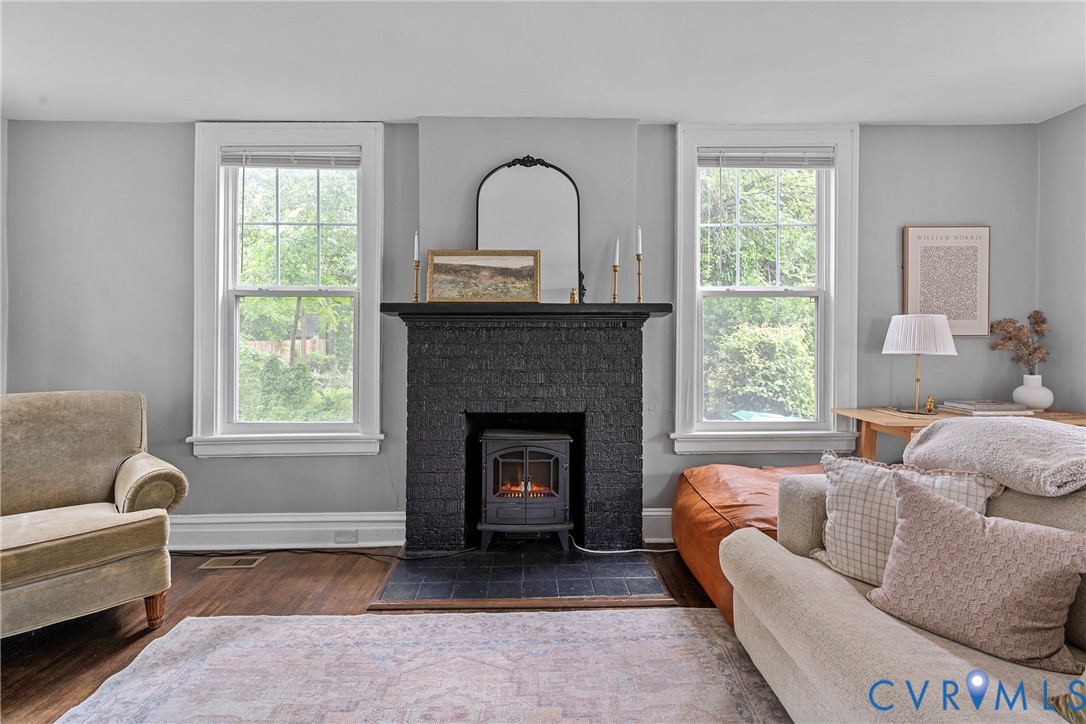 104 West Union Street Sandston, VA 23150 - Photo 7 of 33 a living room with furniture and a fireplace
