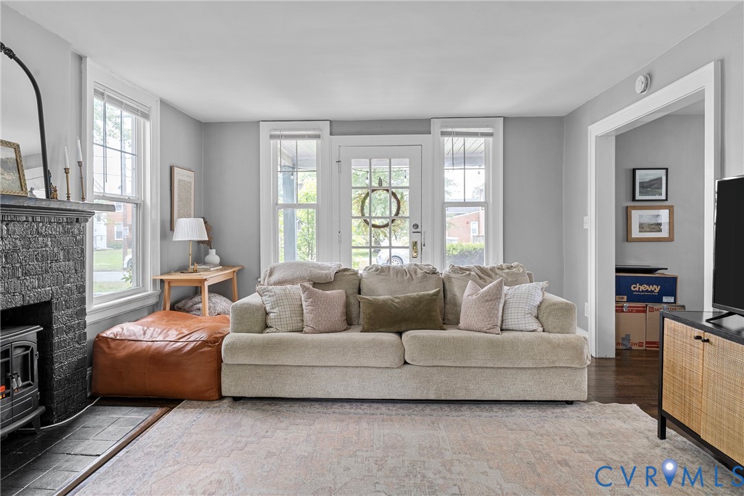 104 West Union Street Sandston, VA 23150 - Photo 9 of 33 a living room with furniture and a large window