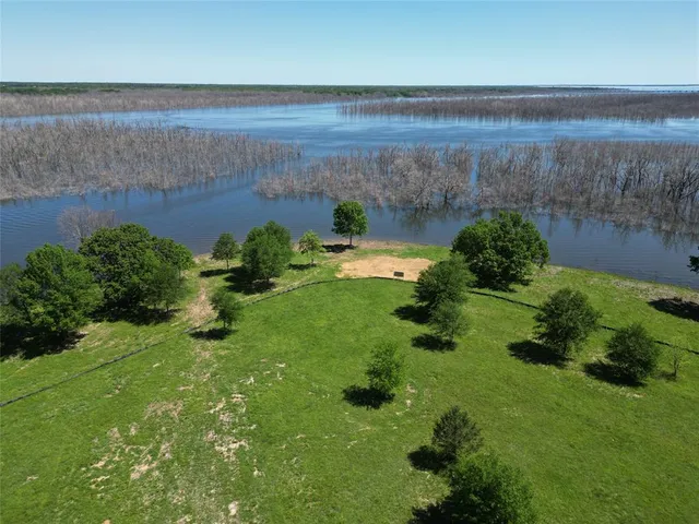 a yard with lots of green space