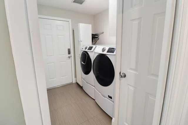 a view of a room with a floor to ceiling window