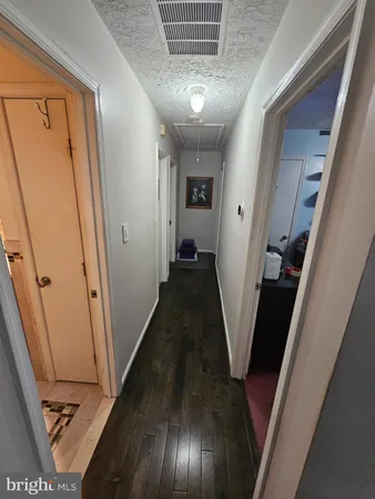 a view of hallway with stairs
