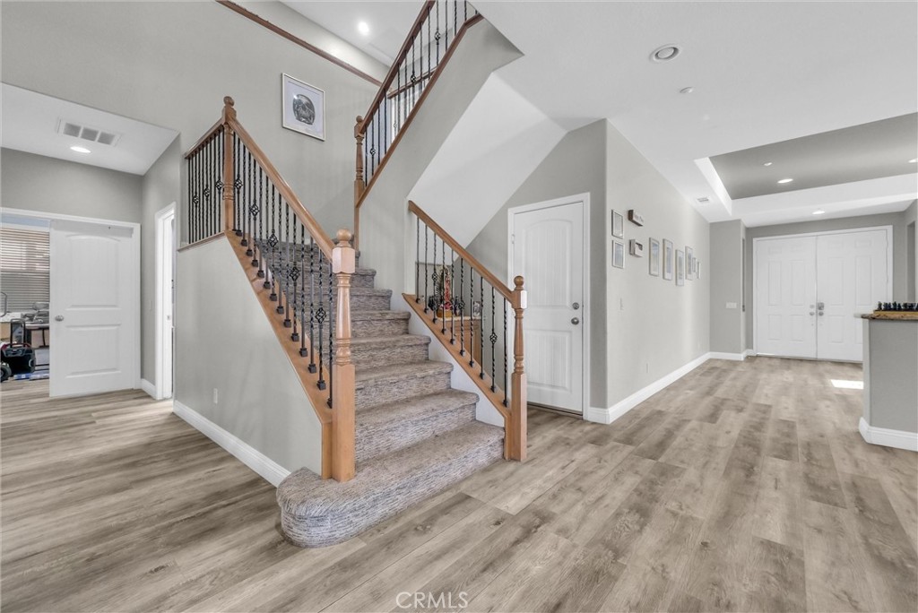 18388 Hidden Ranch Road Riverside, CA 92508 - Photo 20 of 46 a view of entryway and hall with wooden floor