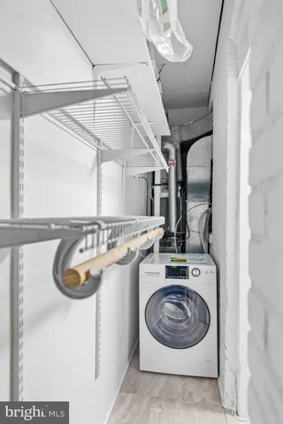 a kitchen with a stove and cabinets