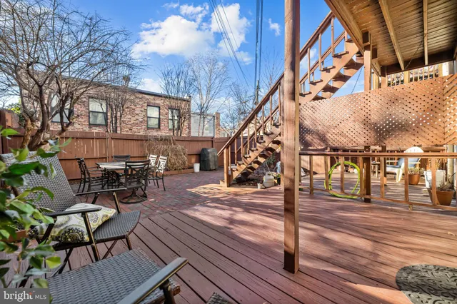 a view of a chairs and tables on the deck