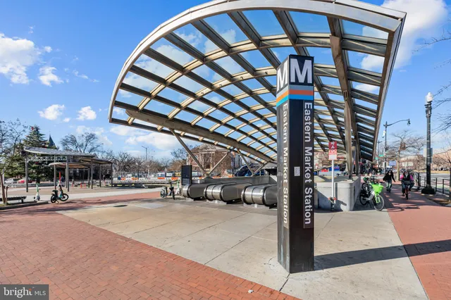 a view of a building with sitting area