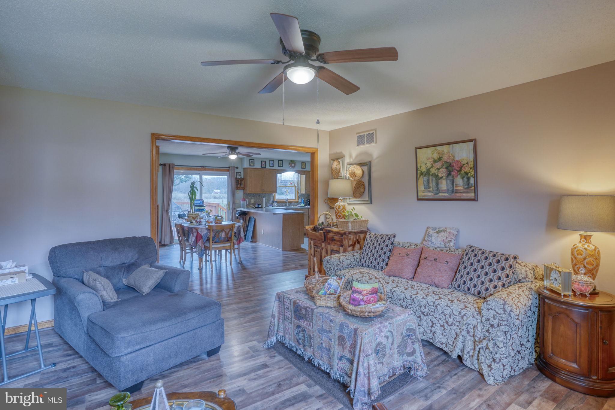 1916 Hartly Road Hartly, DE 19953 - Photo 12 of 44 a living room with furniture and a large window