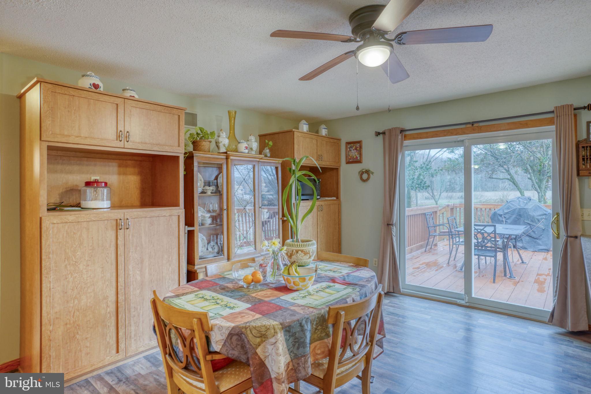 1916 Hartly Road Hartly, DE 19953 - Photo 15 of 44 a view of a dining room with furniture window and wooden floor