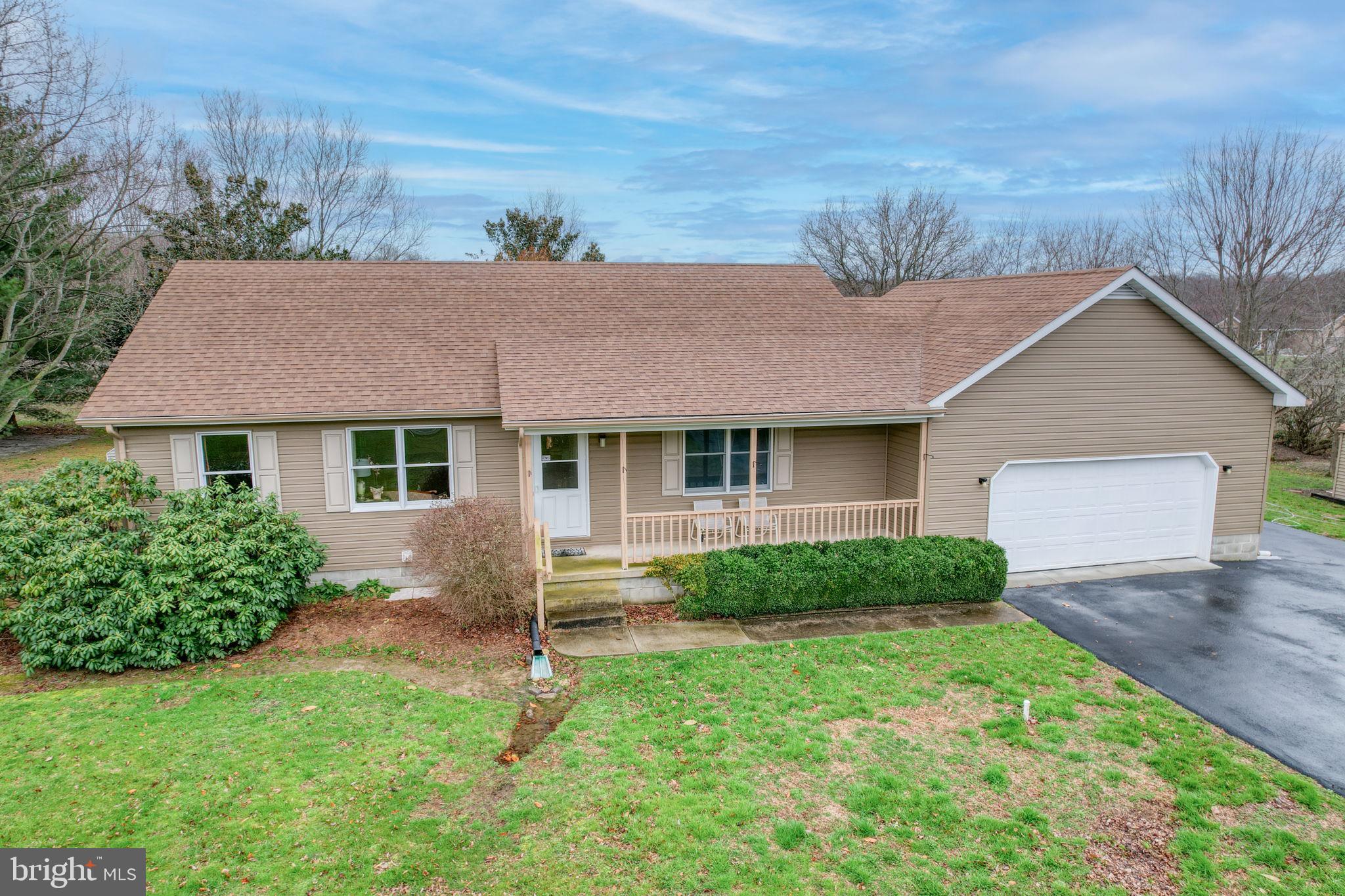 1916 Hartly Road Hartly, DE 19953 - Photo 2 of 44 a view of a house with a yard and a garden