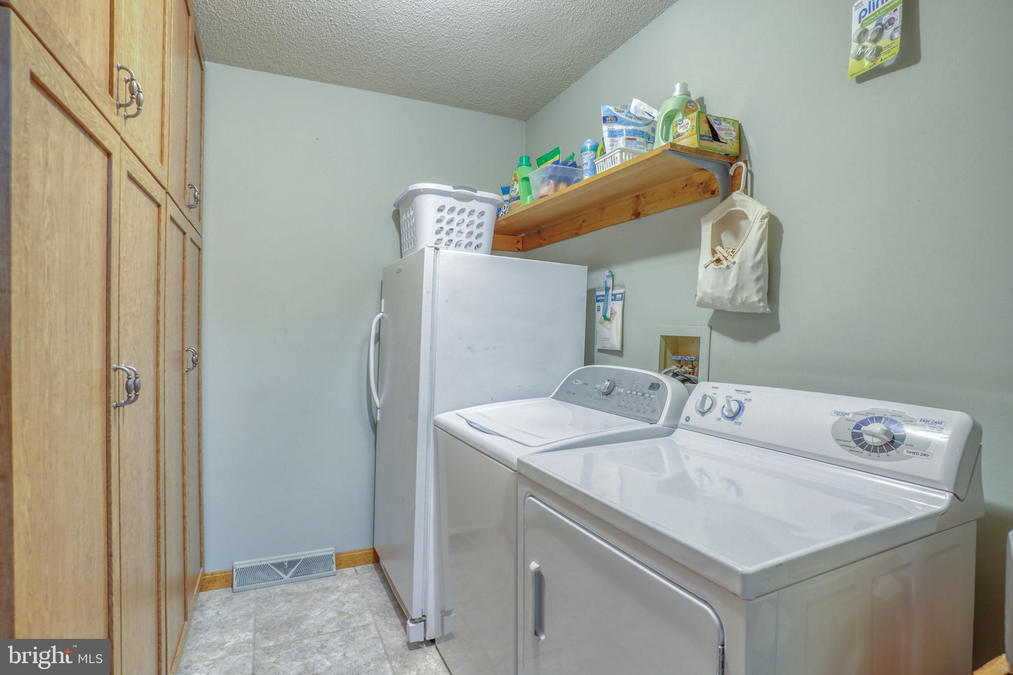 1916 Hartly Road Hartly, DE 19953 - Photo 21 of 44 a utility room with dryer and washer
