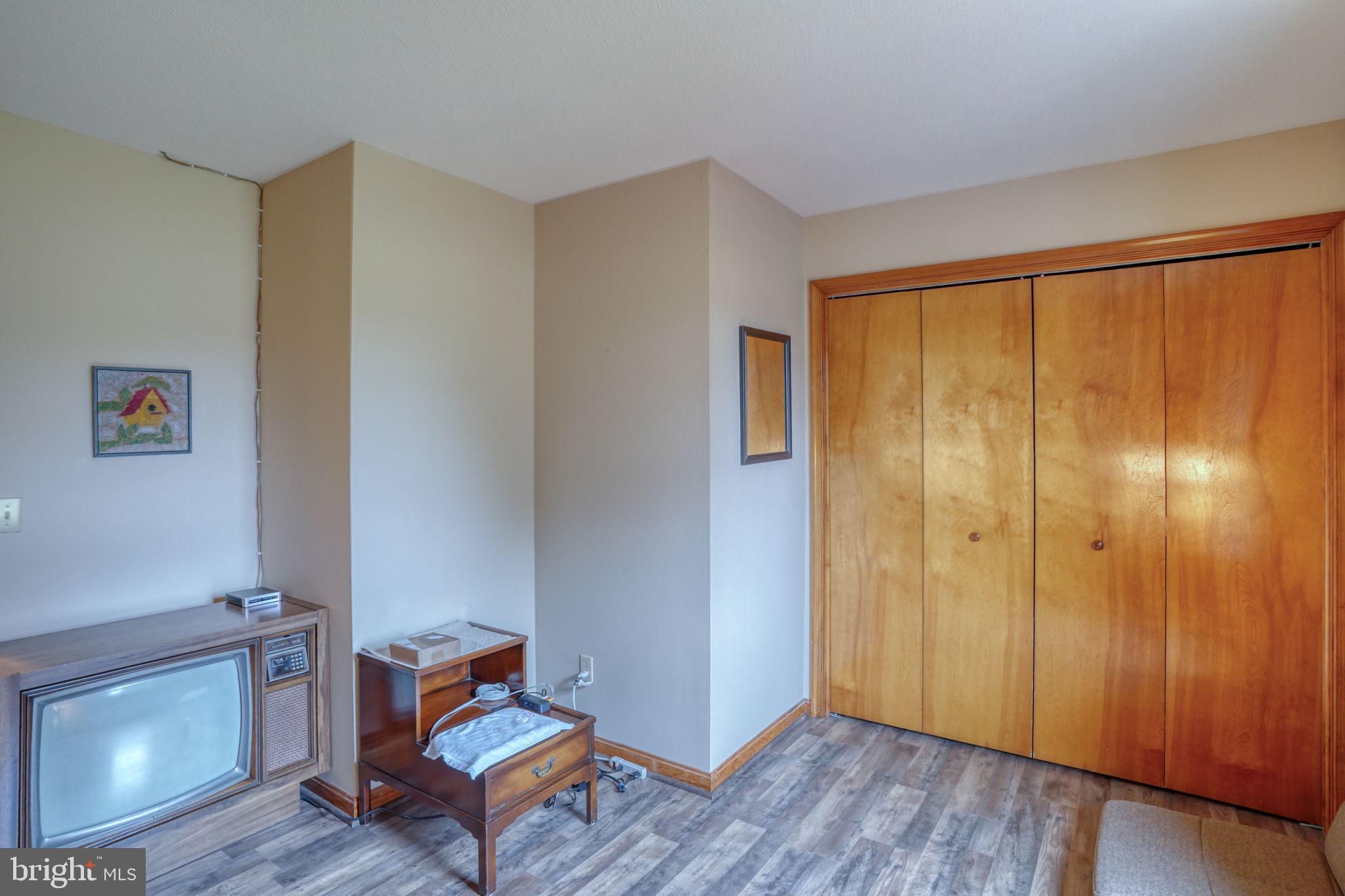 1916 Hartly Road Hartly, DE 19953 - Photo 30 of 44 a view of room with hardwood floor and cabinet