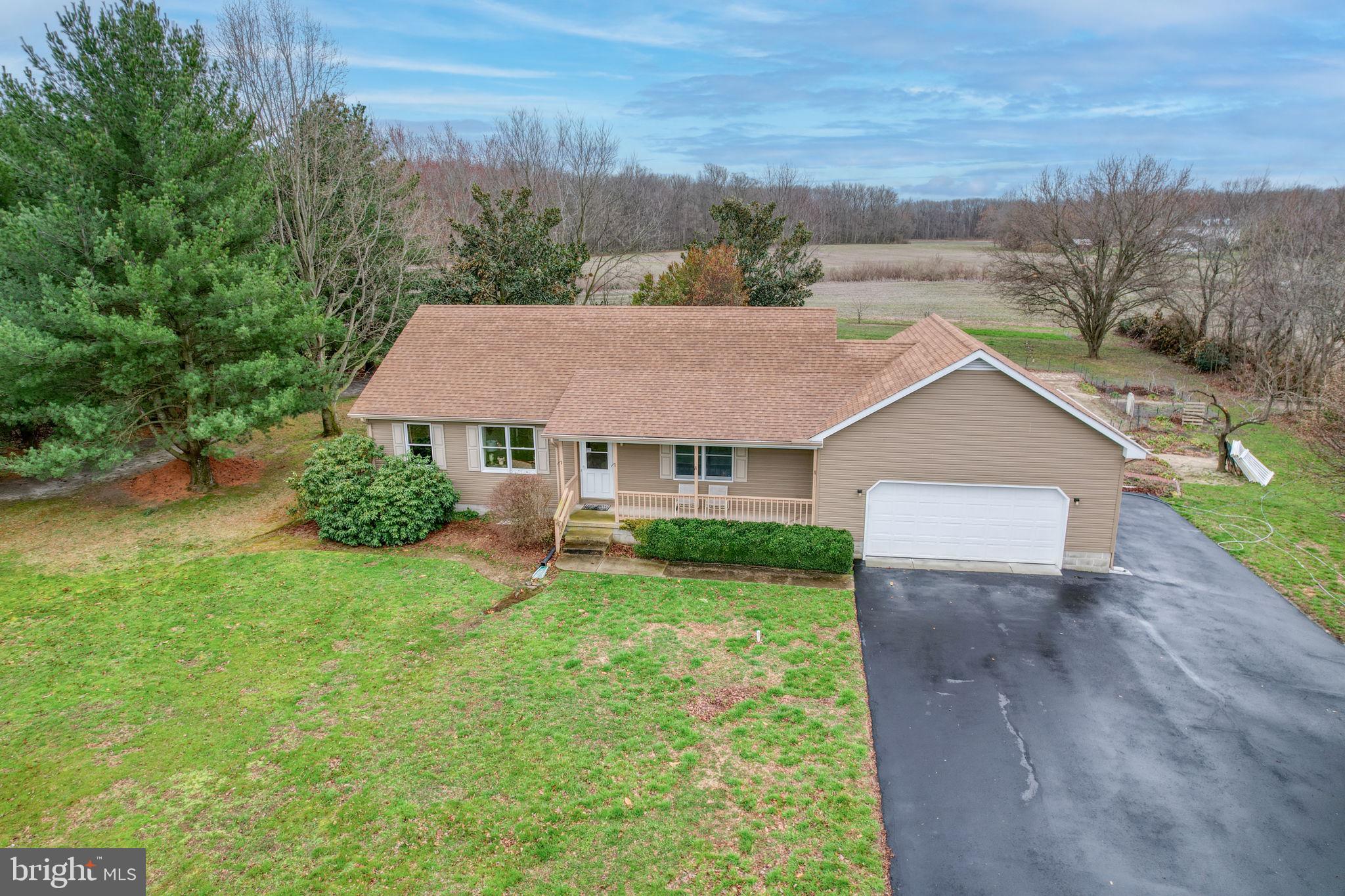1916 Hartly Road Hartly, DE 19953 - Photo 3 of 44 an aerial view of a house next to a yard