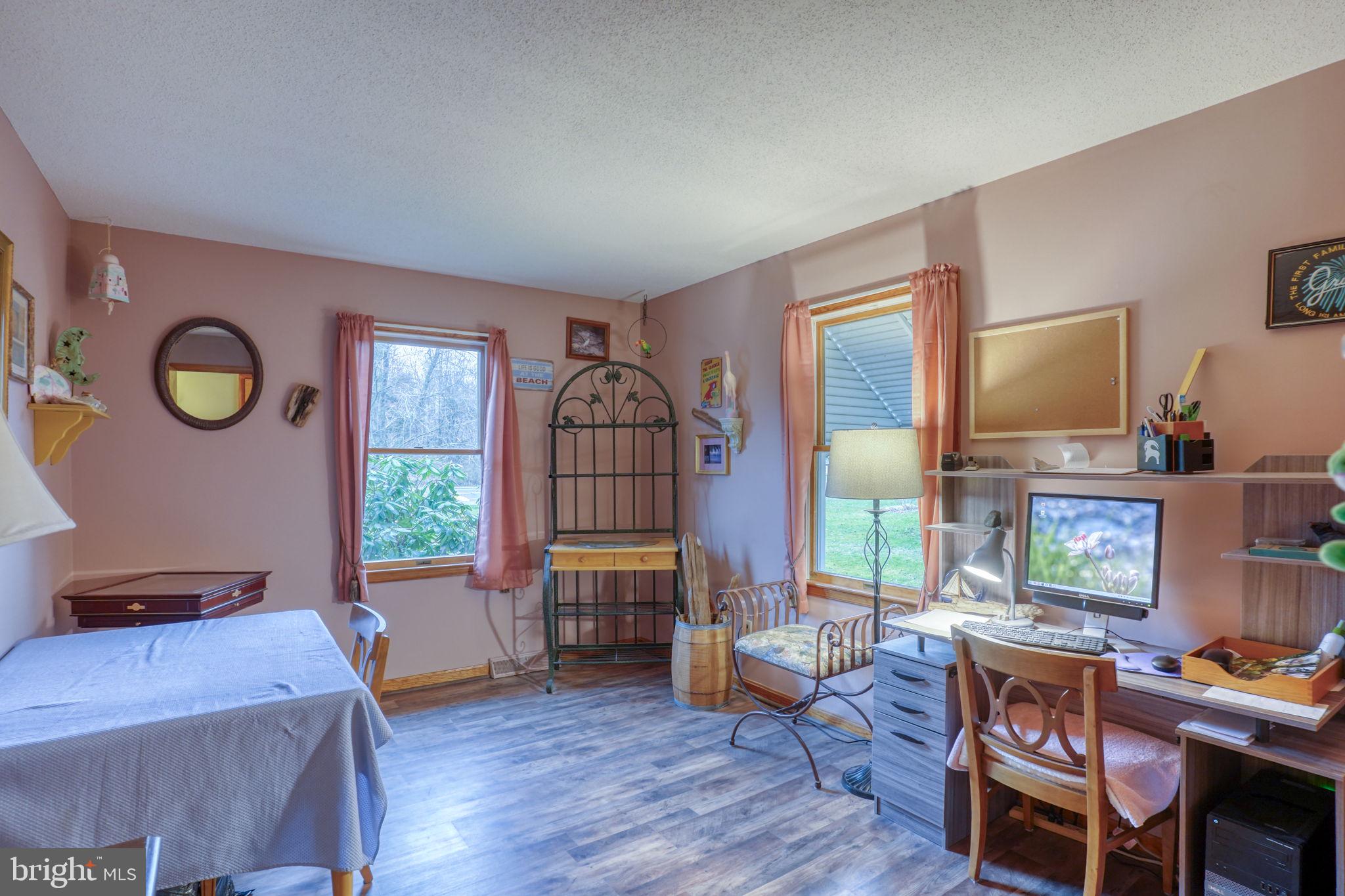 1916 Hartly Road Hartly, DE 19953 - Photo 32 of 44 a living room with furniture and a window