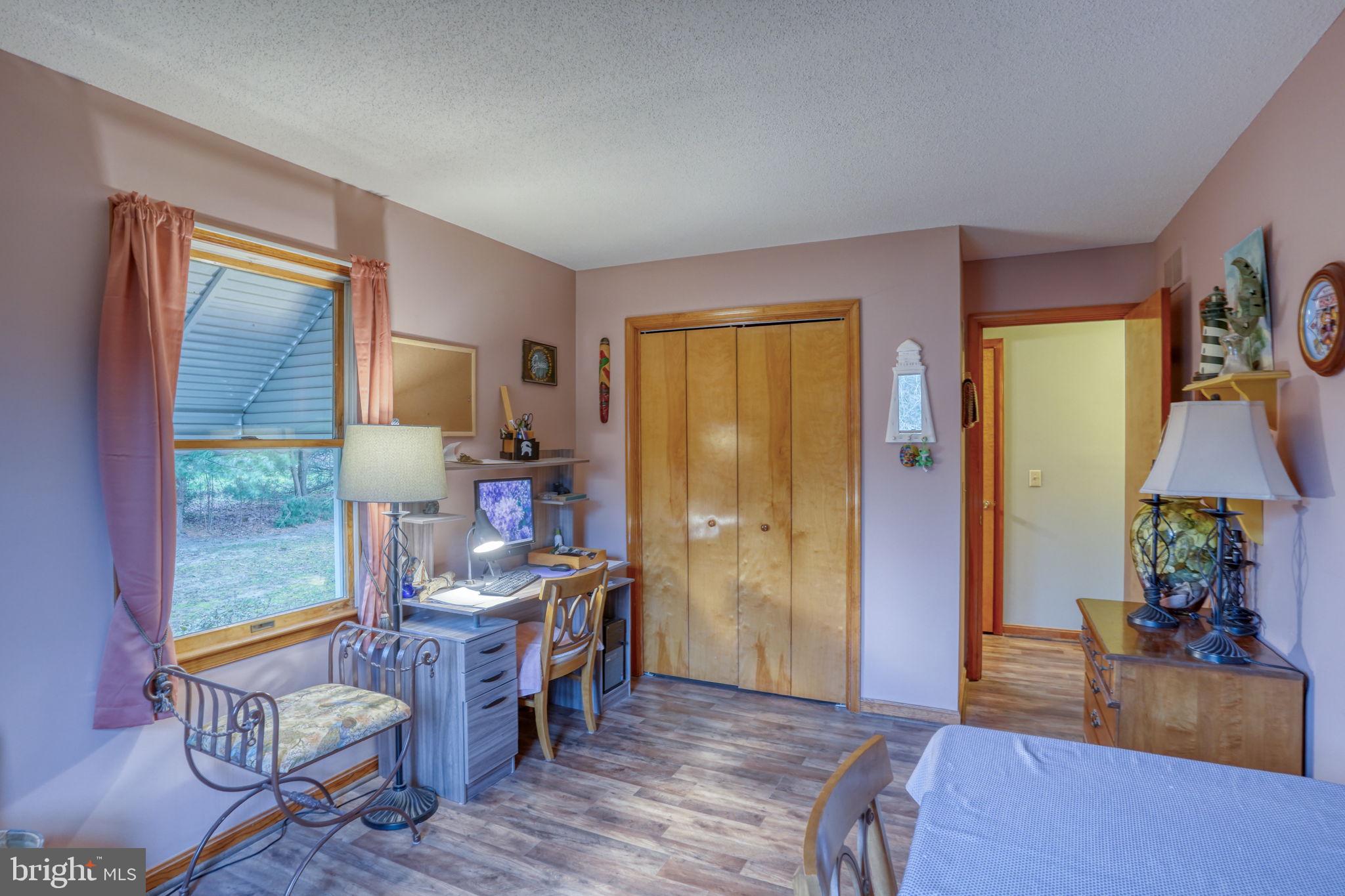 1916 Hartly Road Hartly, DE 19953 - Photo 34 of 44 a living room with furniture and a wooden floor