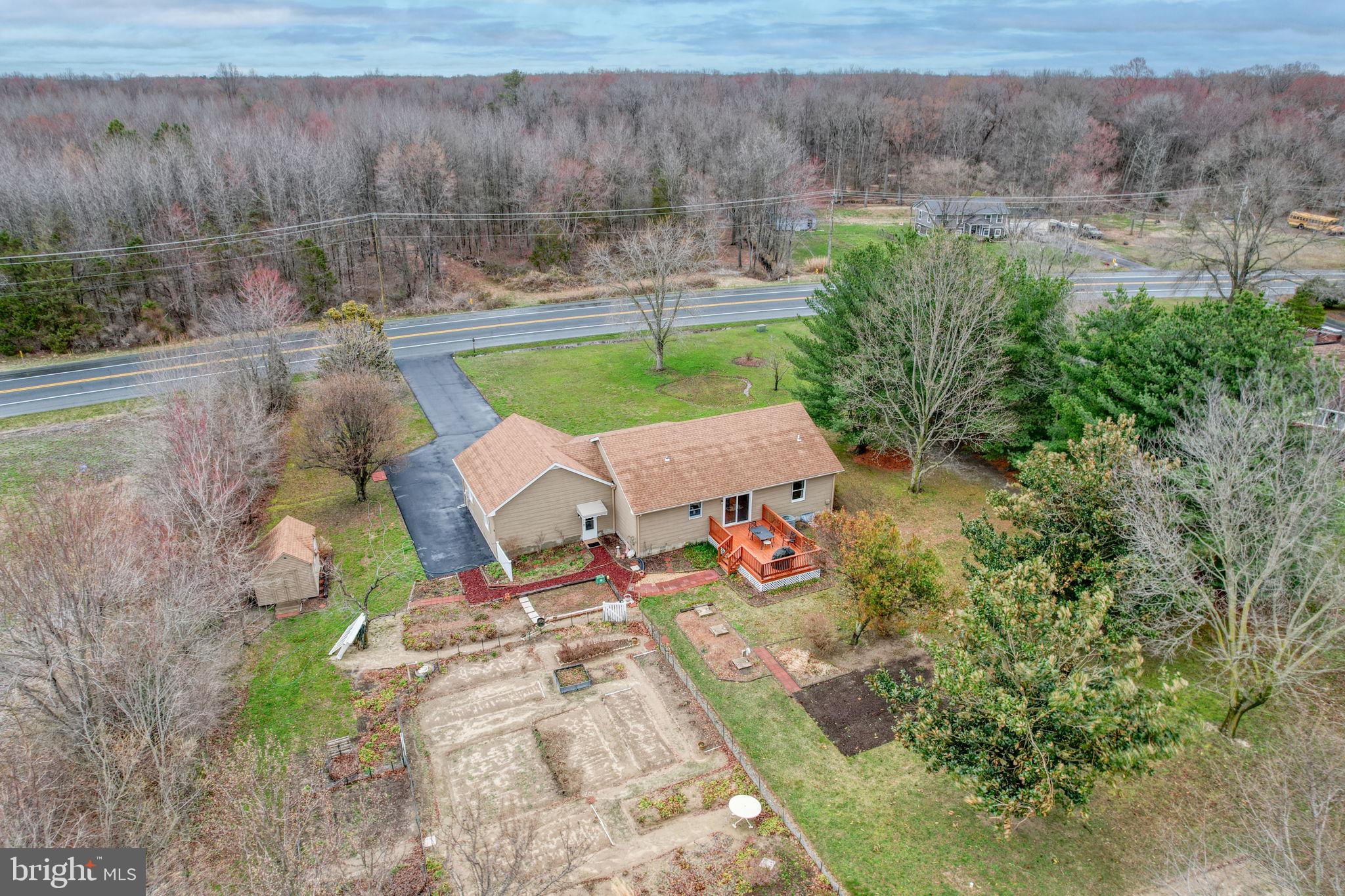 1916 Hartly Road Hartly, DE 19953 - Photo 38 of 44 a view of a backyard with plants and lake view