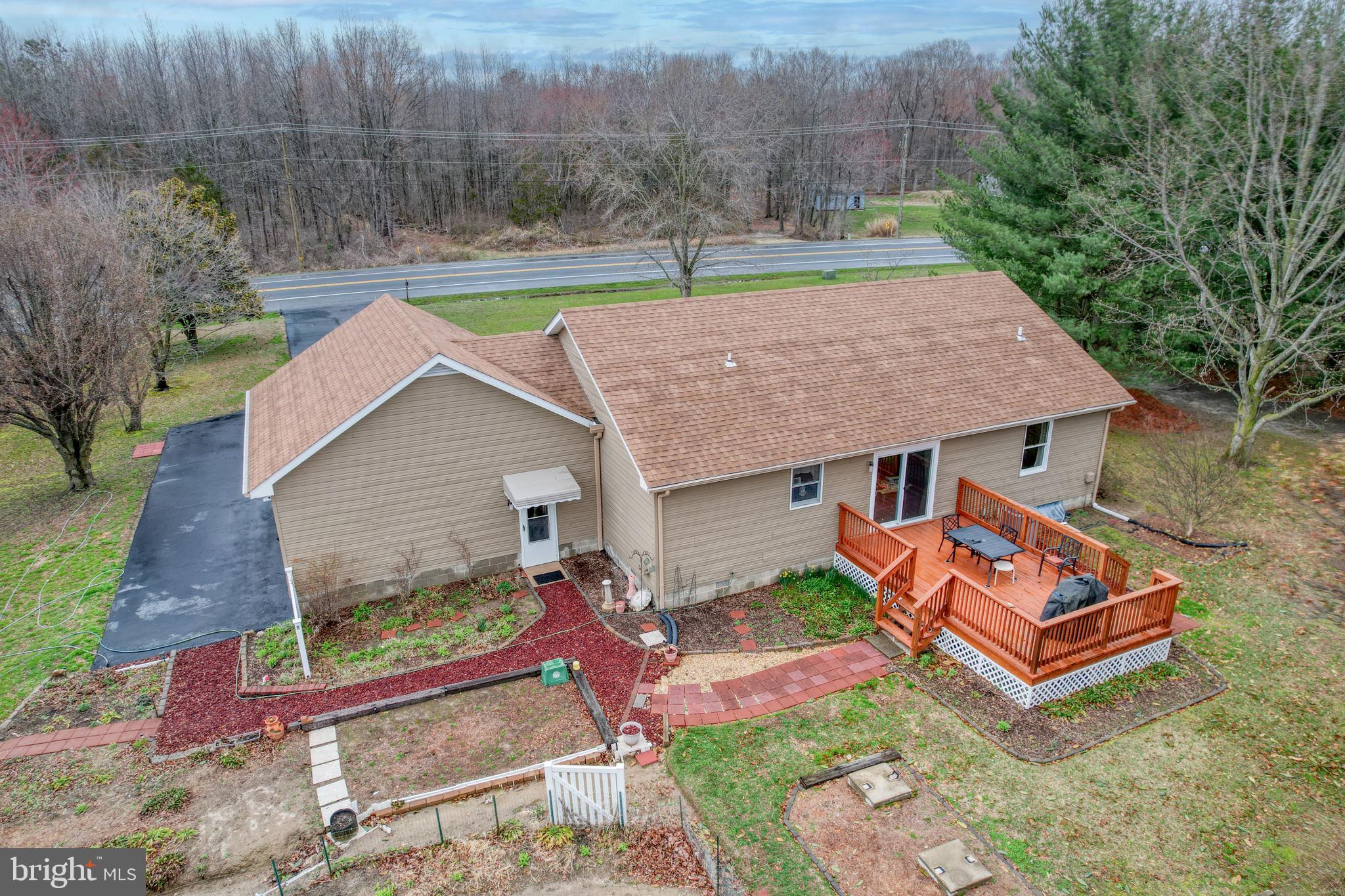 1916 Hartly Road Hartly, DE 19953 - Photo 39 of 44 an aerial view of a house with swimming pool and a yard