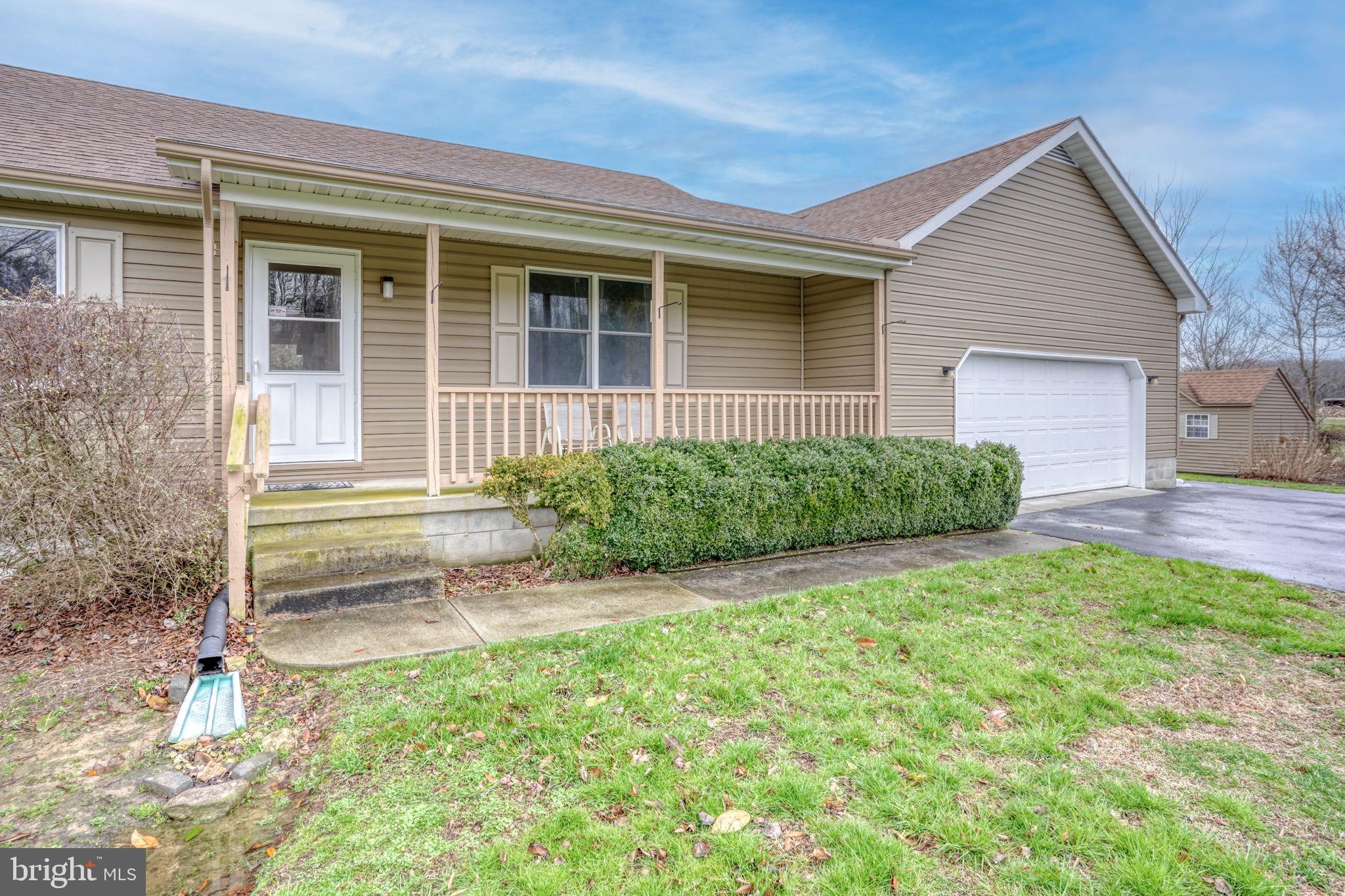 1916 Hartly Road Hartly, DE 19953 - Photo 8 of 44 front view of a house with a yard