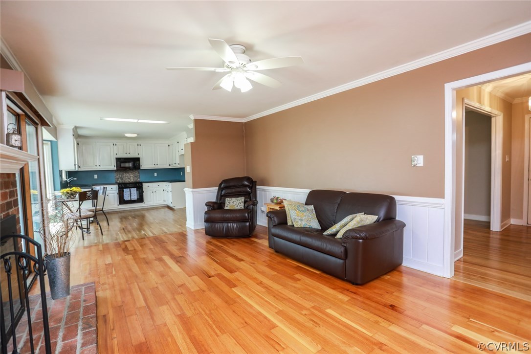 1420 Kingscross Road Midlothian, VA 23114 - Photo 14 of 48 a living room with furniture and kitchen view