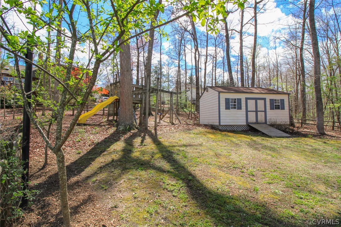 1420 Kingscross Road Midlothian, VA 23114 - Photo 41 of 48 a view of a house with a yard
