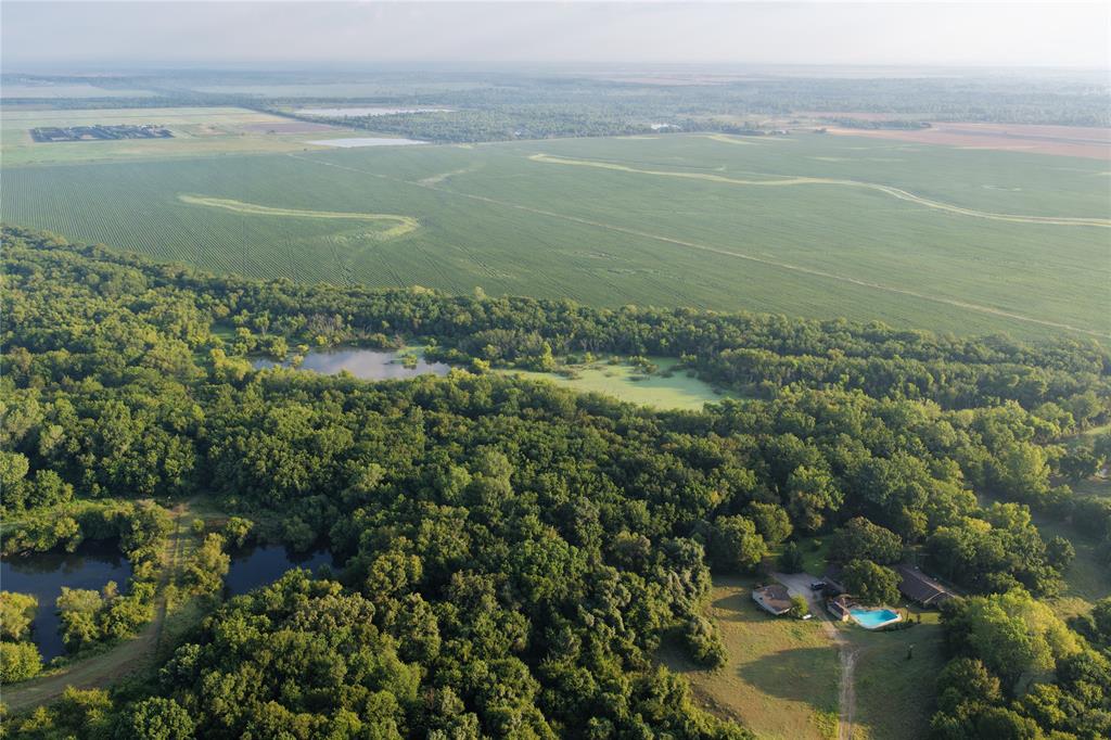 830 10 Mile Road Ferris, TX 75125 - Photo 11 of 11 a view of a lake with a mountain