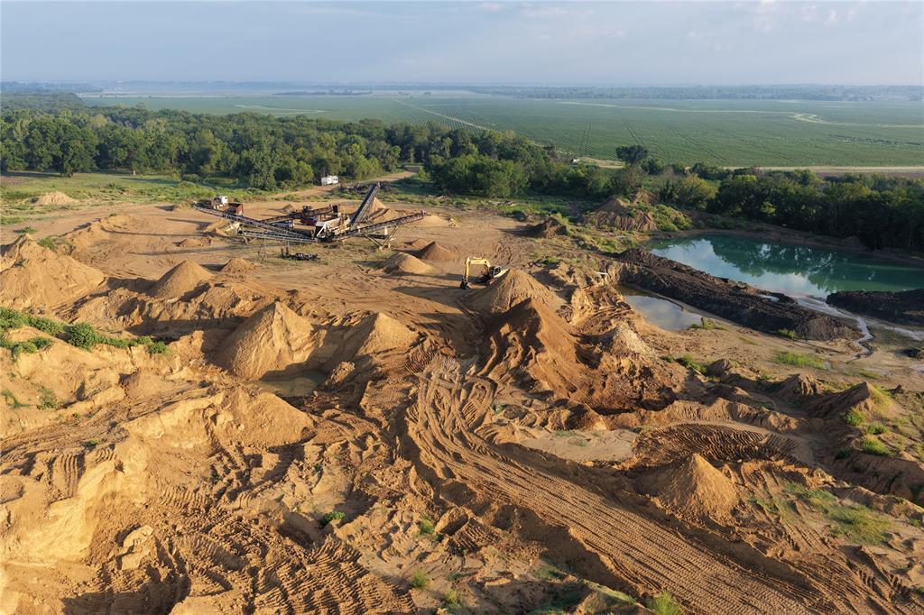 830 10 Mile Road Ferris, TX 75125 - Photo 6 of 11 a view of a lake with outdoor space