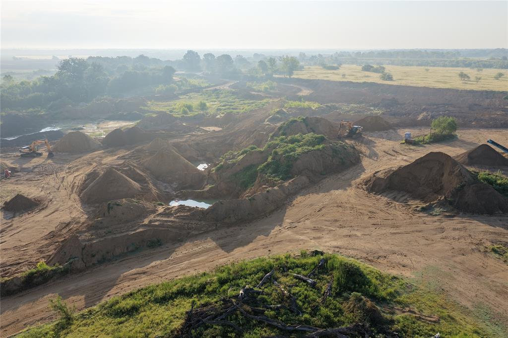 830 10 Mile Road Ferris, TX 75125 - Photo 8 of 11 a view of a road with an ocean view
