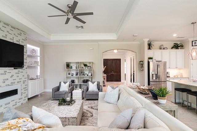 2134 Antigua Lane Naples, FL 34120 - Photo 2 of 26 a living room with furniture and a flat screen tv