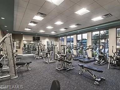 2134 Antigua Lane Naples, FL 34120 - Photo 22 of 26 a view of a room with gym equipment