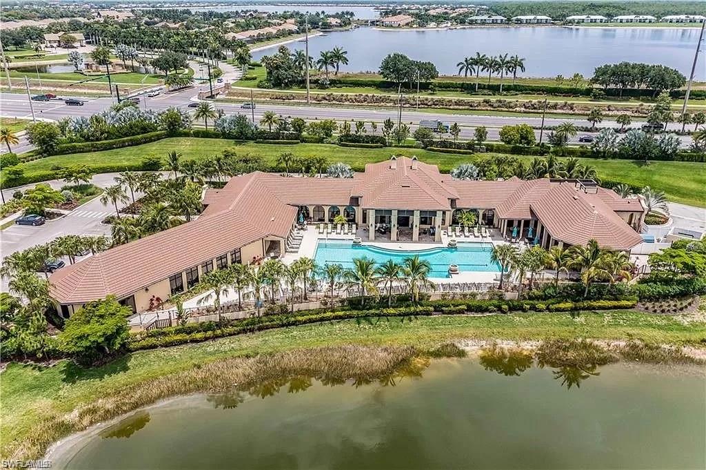 2134 Antigua Lane Naples, FL 34120 - Photo 26 of 26 an aerial view of residential houses with outdoor space and swimming pool
