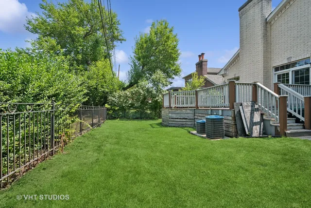 a view of a garden with a house