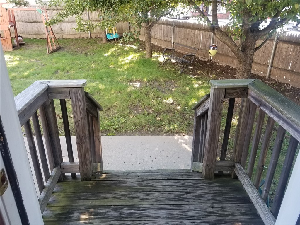 152 Samuel Avenue, Unit 152 Pawtucket, RI 02860 - Photo 18 of 21 deck and shared back yard