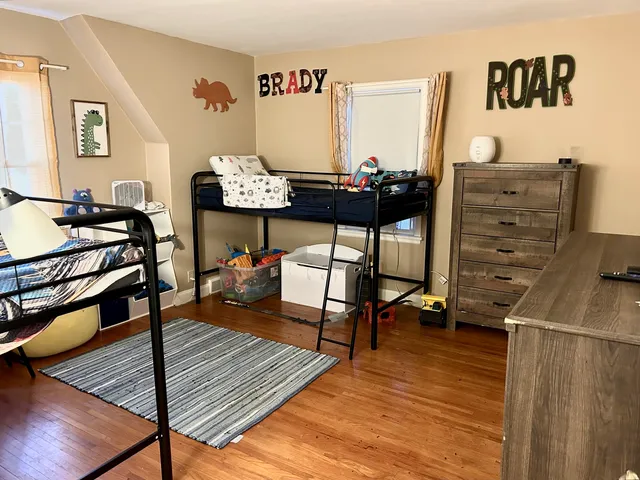 a view of a workspace with furniture