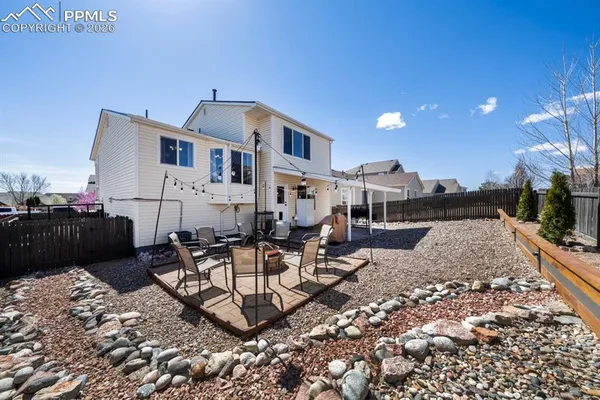 a view of a house with a patio